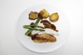 Roast chicken meal with organic asparagus, potatoes and gravy